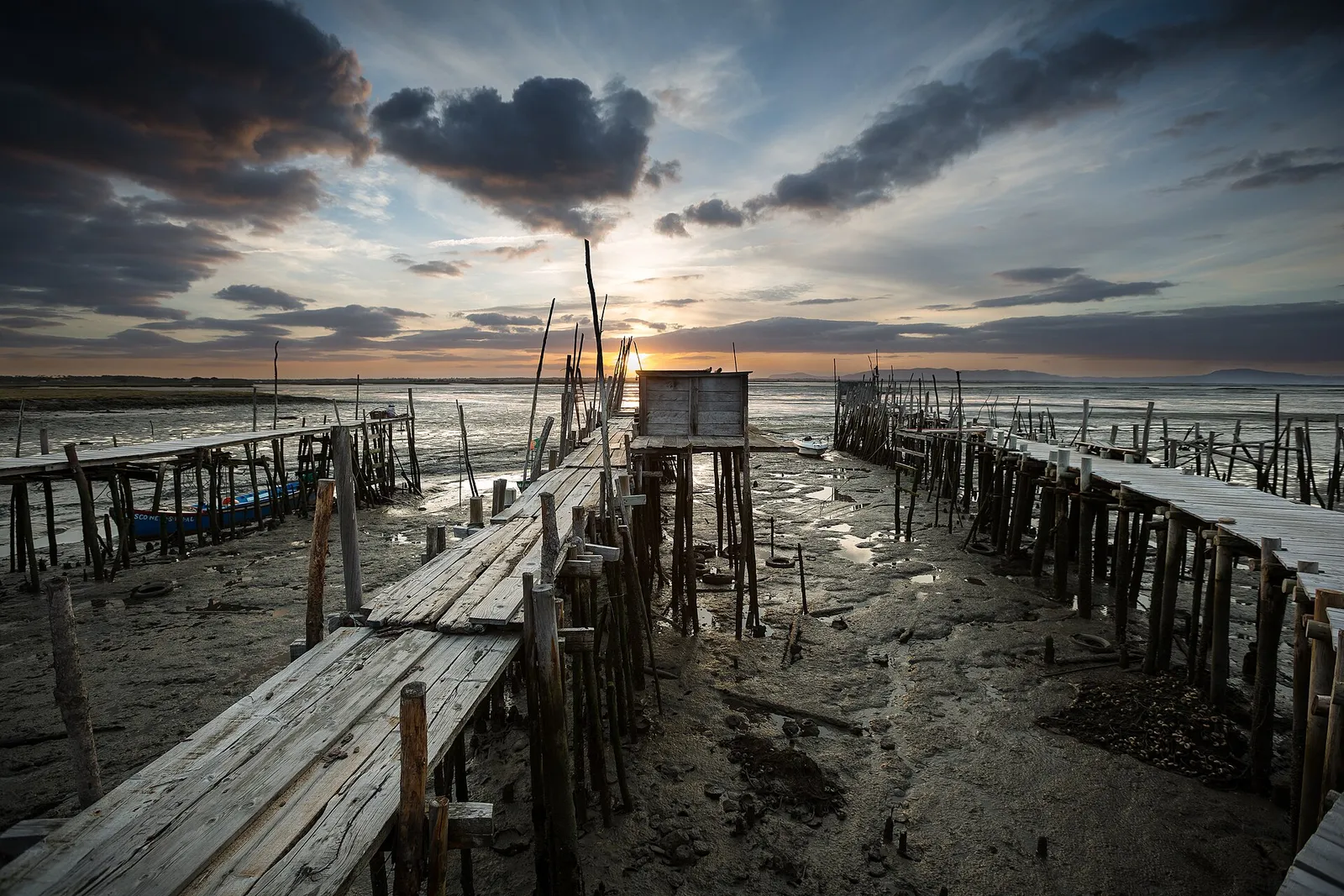 The Carrasqueira stilt pier on the Sado estuary at sunset
